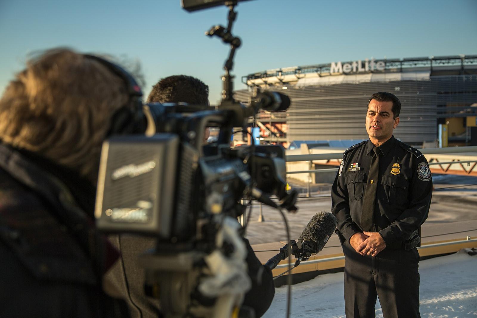 Director New York Field Operations Robert Perez is interviewed outside MetLife Stadium
